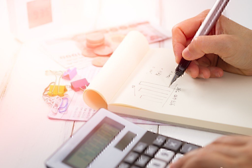 a man doing taxes and writing