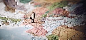 a tiny man on a map