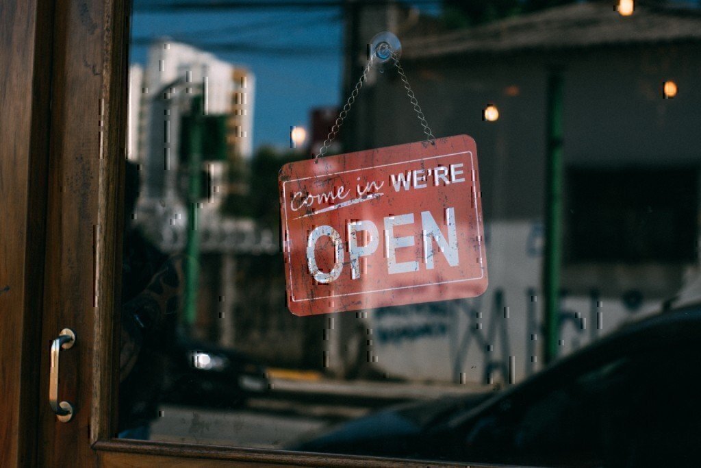 an open sign in a small business