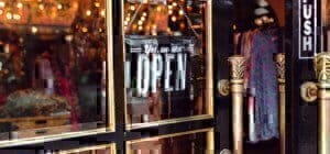 a store front with an open sign