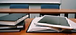 a picture of a few books and an ipad