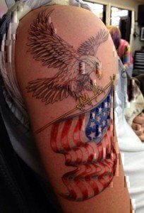 cool bald eagle and american flag tattoo idea