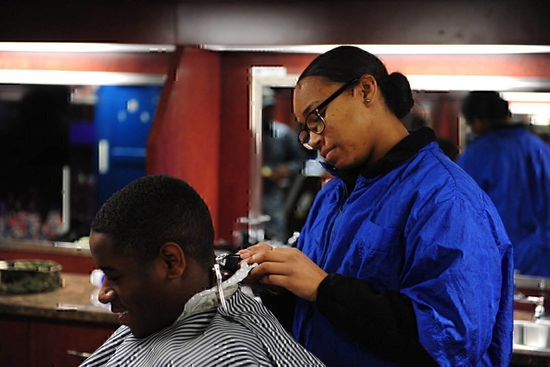 a man getting a hair cut