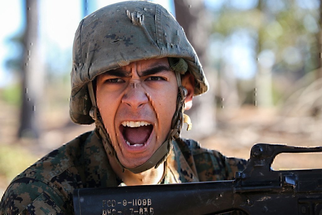 a soldier yelling at work