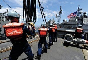 120718-N-WA347-016 PACIFIC OCEAN (July 18, 2012) Sailors assigned to Cargo Afloat Rig Team (CART) 1 and crew members aboard the Military Sealift Command fleet replenishment oiler USNS Henry J. Kaiser (T-AO 187) prepare to transfer biofuel to the guided-missile cruiser USS Princeton (CG 59) during the Great Green Fleet demonstration portion of the Rim of the Pacific (RIMPAC) 2012 exercise. Princeton took on a 50-50 blend of advanced biofuel and traditional petroleum-based fuel. Twenty-two nations, more than 40 ships and submarines, more than 200 aircraft and 25,000 personnel are participating in the RIMPAC exercise from June 29 to Aug. 3, in and around the Hawaiian Islands. The world’s largest international maritime exercise, RIMPAC provides a unique training opportunity that helps participants foster and sustain the cooperative relationships that are critical to ensuring the safety of sea lanes and security on the world’s oceans. RIMPAC 2012 is the 23rd exercise in the series that began in 1971. (U.S. Navy photo by Mass Communication Specialist 2nd Class Eva-Marie Ramsaran/Released)