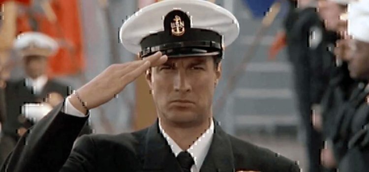 a navy sailor saluting