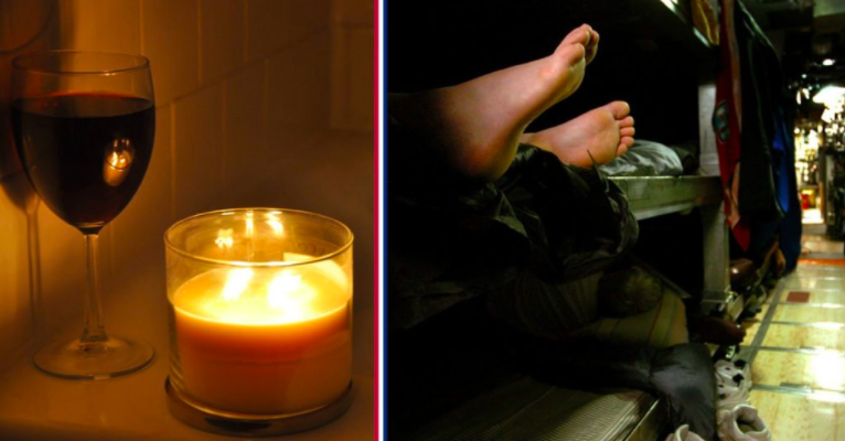 Photo shows a candle and a pair of feet
