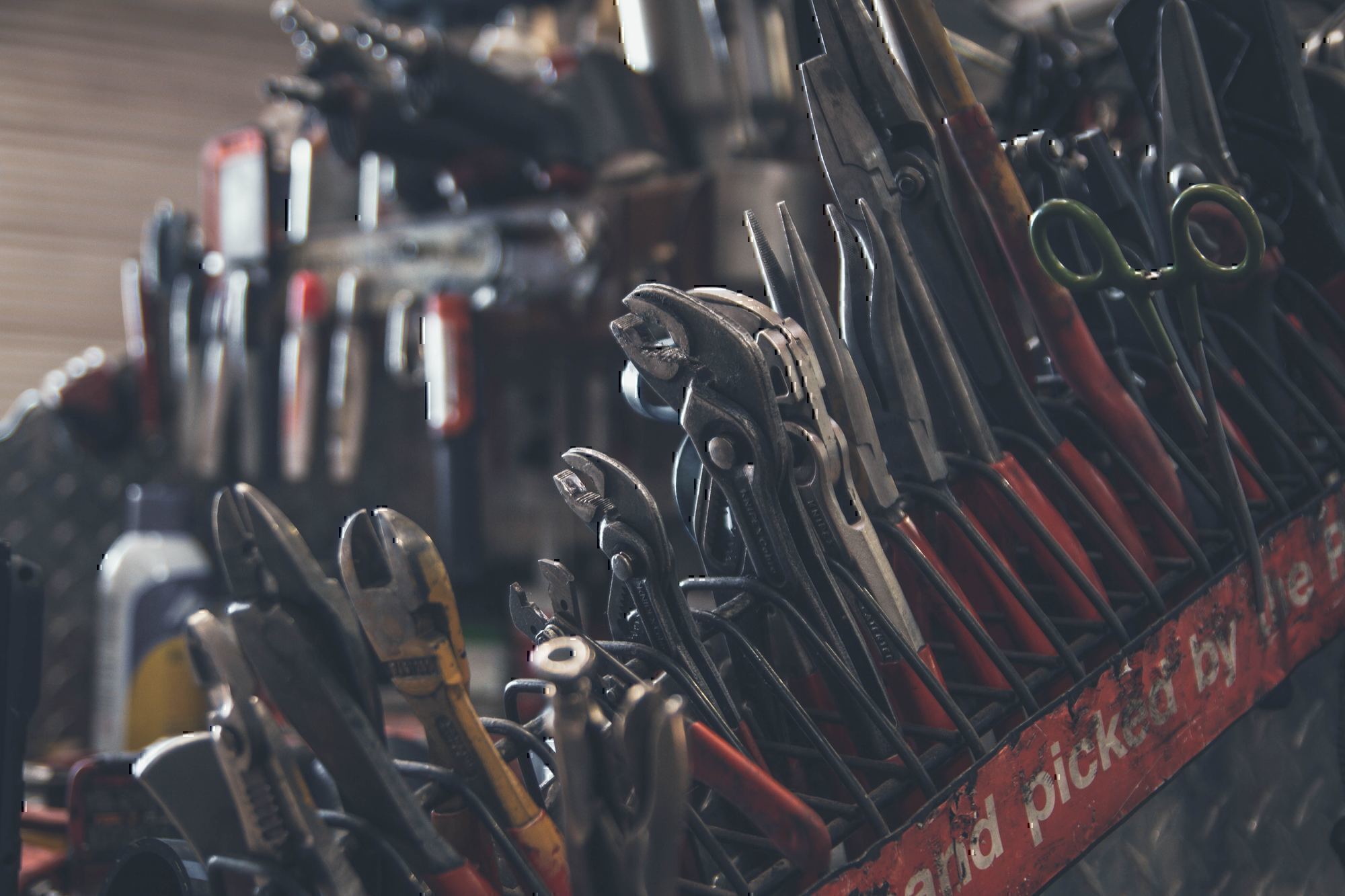 an assortment of hand tools in a tool box