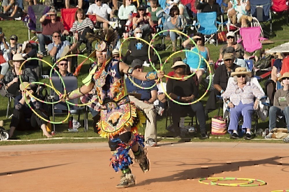 Army veteran performs a native american dance