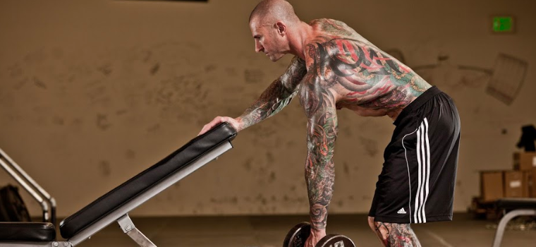 A Man lifting weights