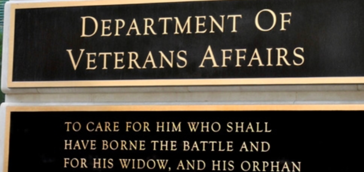 a plaque with the veterans affairs slogan on it