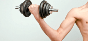 a man lifting a weight and flexing his arm