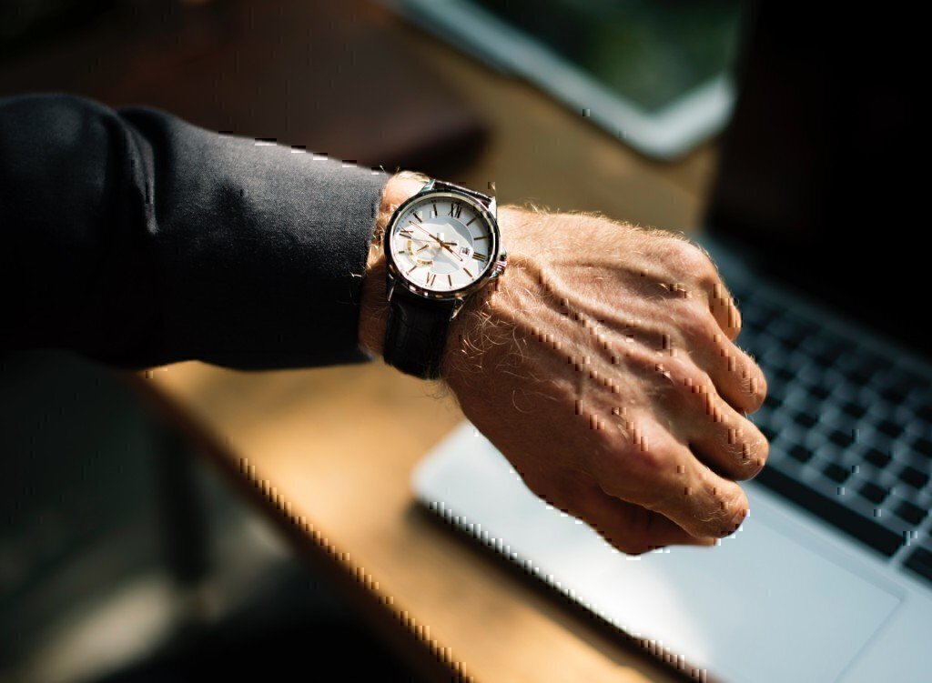 a man checking his watch