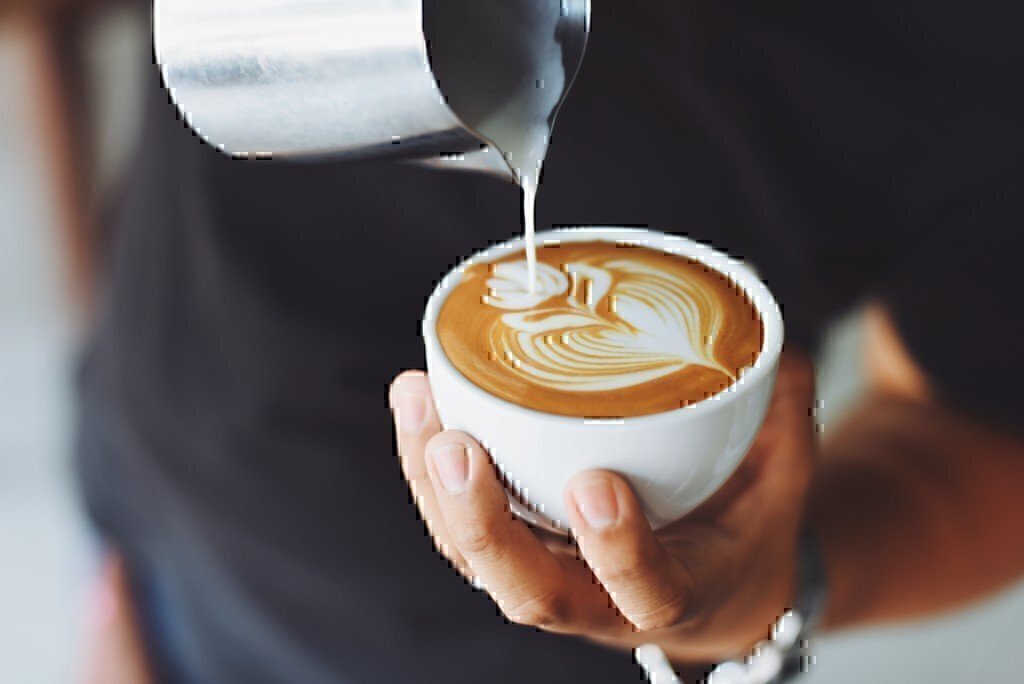 a picture of a man pouring coffee