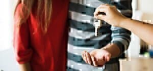 a couple grabbing keys when moving