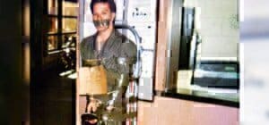 a man taped up to the wall