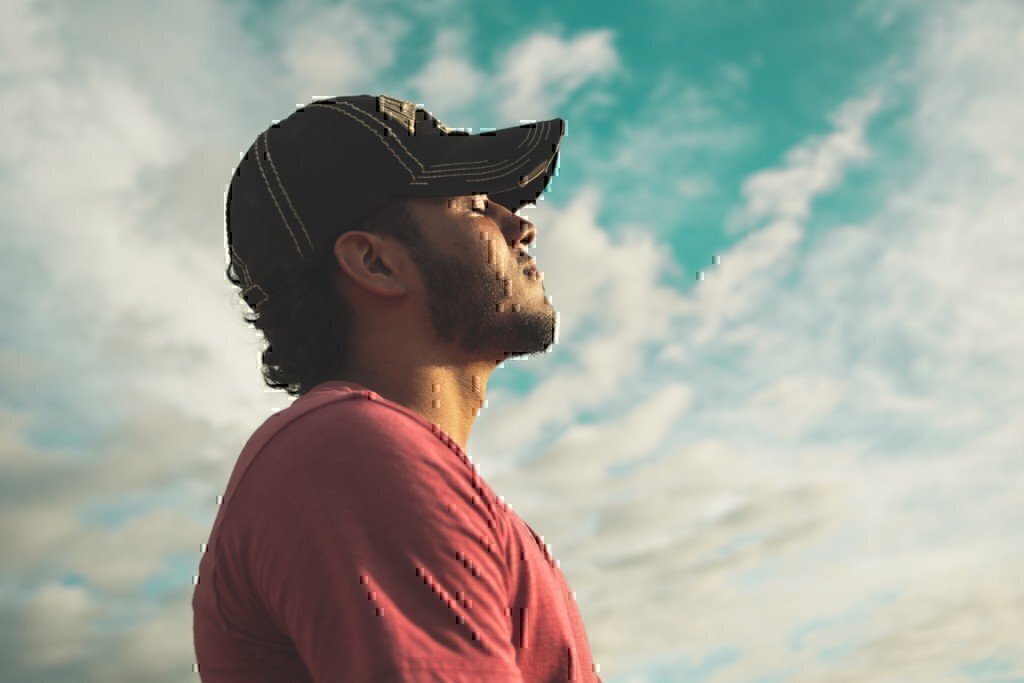 a guy relaxing with his eyes closed