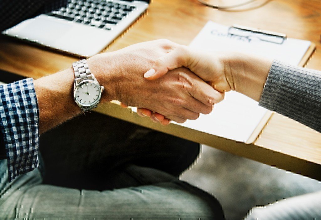 two people shaking hands