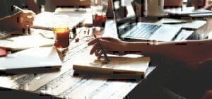 a guy writing a cover letter