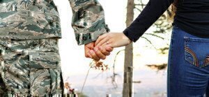 a picture of a couple holding hands