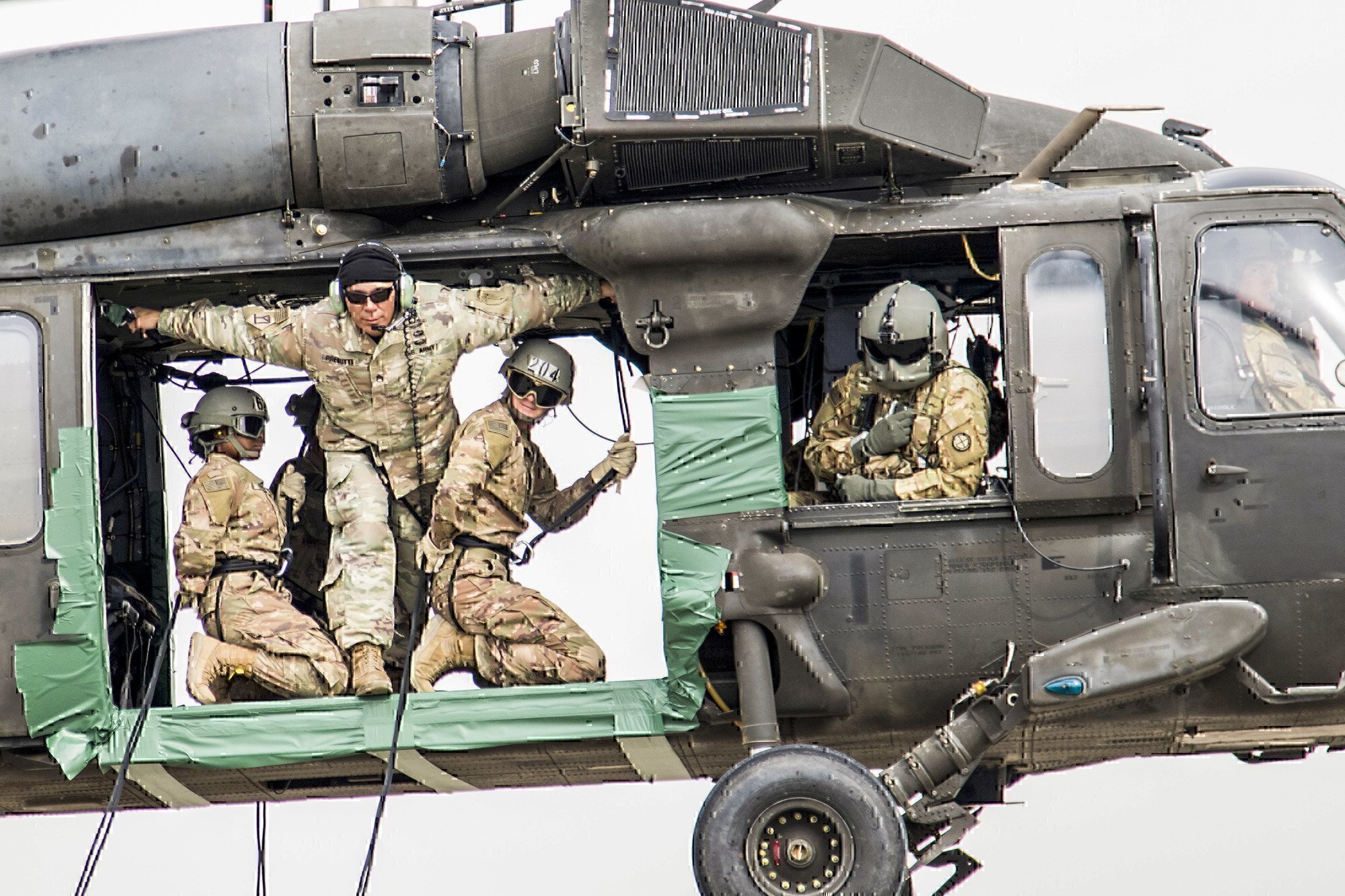 a group of pilots on a black hawk training