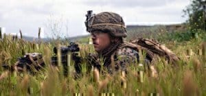 a soldier on the ground training
