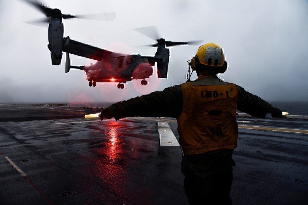 a soldier training with a helicopter