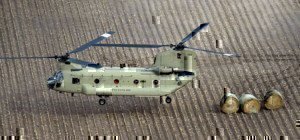 national guard helicopter dropping off hay