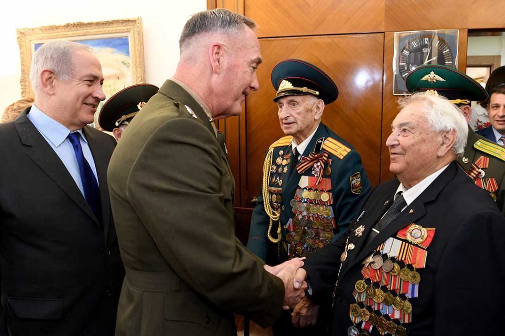 Marine Corps Gen. Joe Dunford, chairman of the Joint Chiefs of Staff, shakes hands with a World War II veteran during a meeting with Israeli Prime Minister Benjamin Netanyahu in Jerusalem, May 9, 2017. DoD photo by Matty Stern