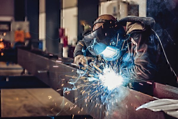 a welder working on some material