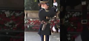tomb of the unknown soldier with a pistol and rifle
