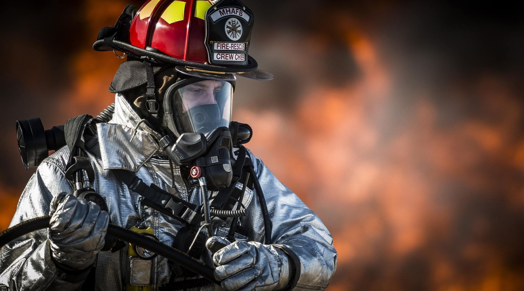 a firefighter with breathing equipment on