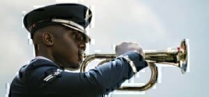 an airman playing a trumpet