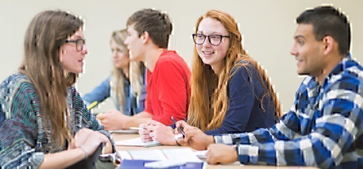 college-students-talking-in-classroom