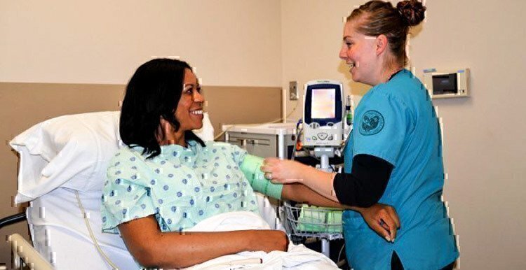 kristina-snell-taking-a-patients-blood-pressure