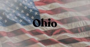 American flag backdrop with the word Ohio written in black centered text.
